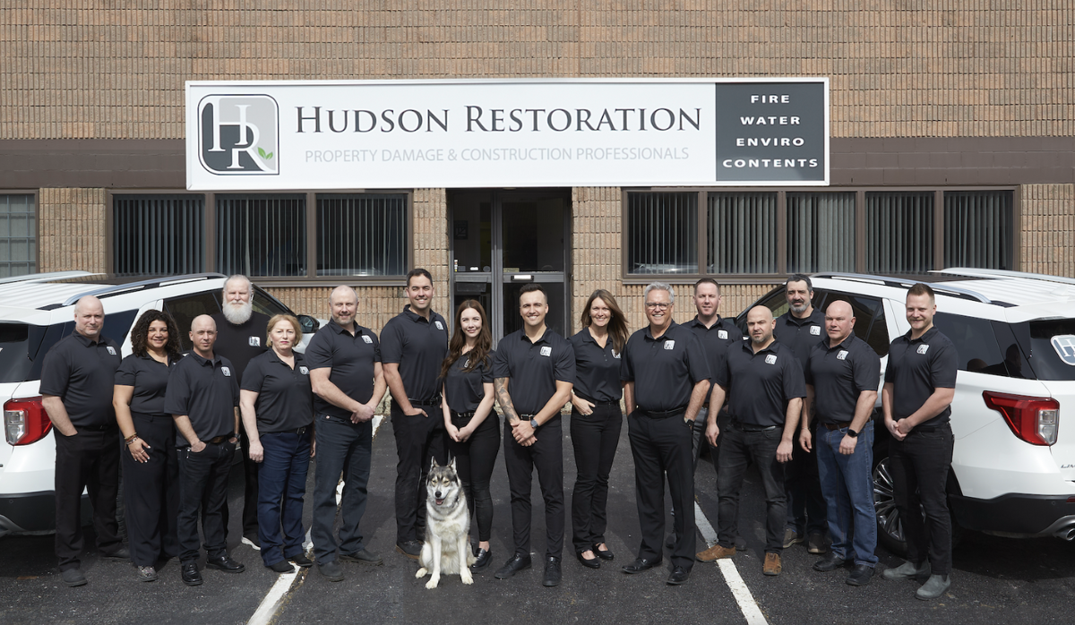 Hudson Restoration Team Standing Out Front of Burlington Office