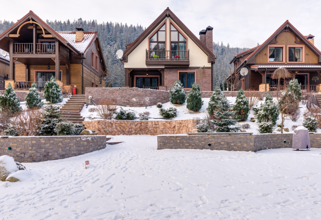 Outdoor landscaping of modern cottage during winter